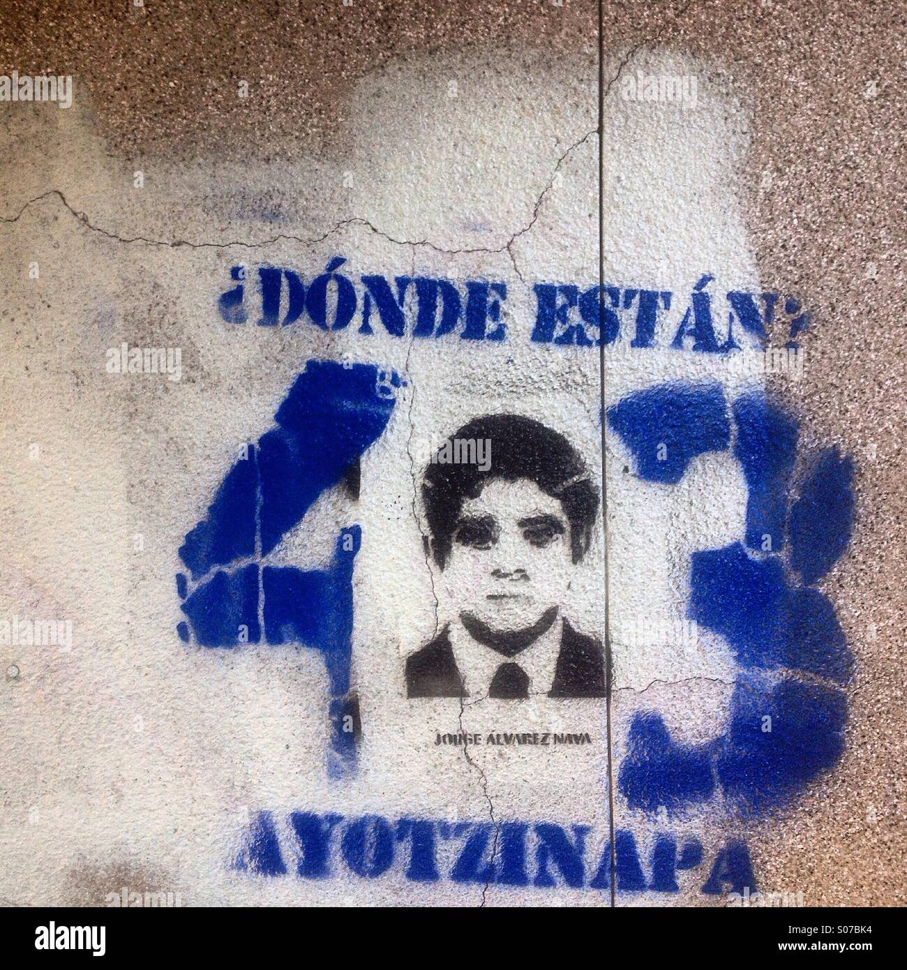 A graffiti shows a portrait of Jose Alvarez Nava, one of the 43 missing students of Ayotzinapa. The sign reads 'Where are they?' - Smartphone Captured Stock Image