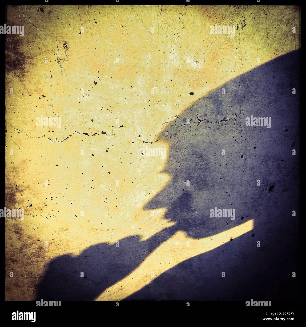 Anonymous shadow thinking - Smartphone Captured Stock Image