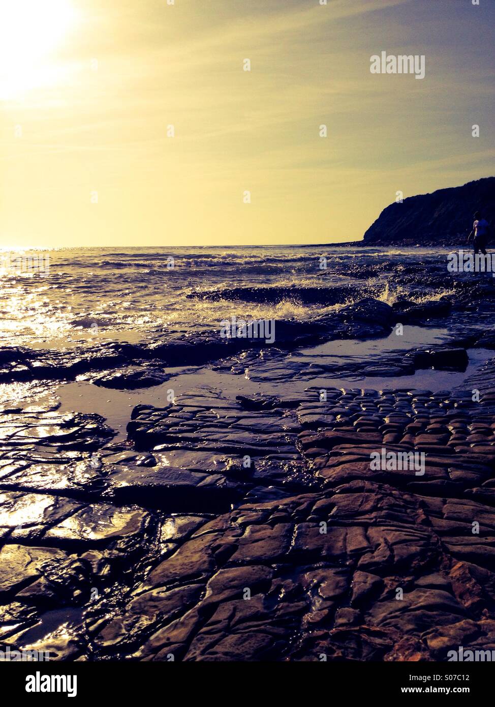 Halloween 2014 sun reflection on coastline Stock Photo