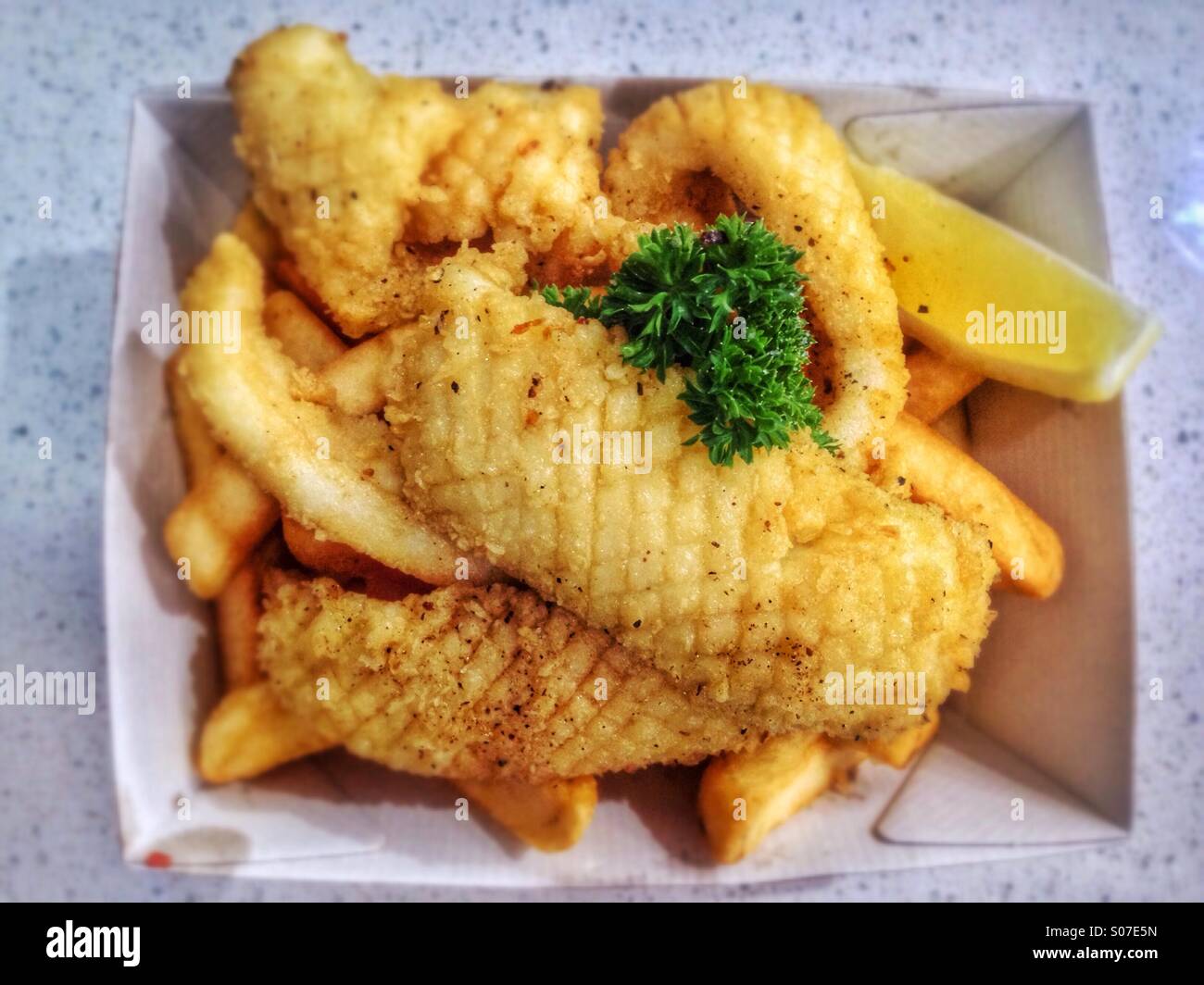 Salt and pepper squid with chips. - Smartphone Captured Stock Image