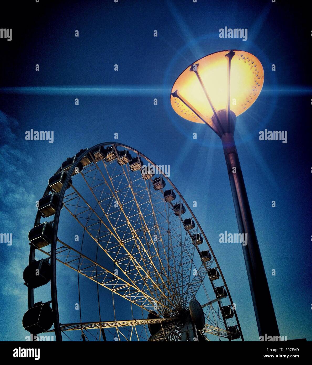 Wheel of Manchester and light in Piccadilly Gardens - Smartphone Captured Stock Image