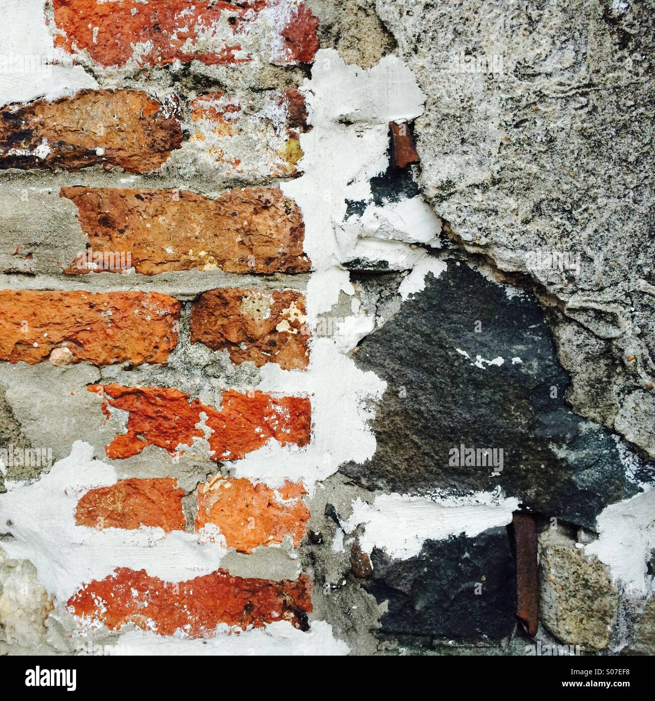 Heavily textures brick and rock wall Stock Photo Alamy