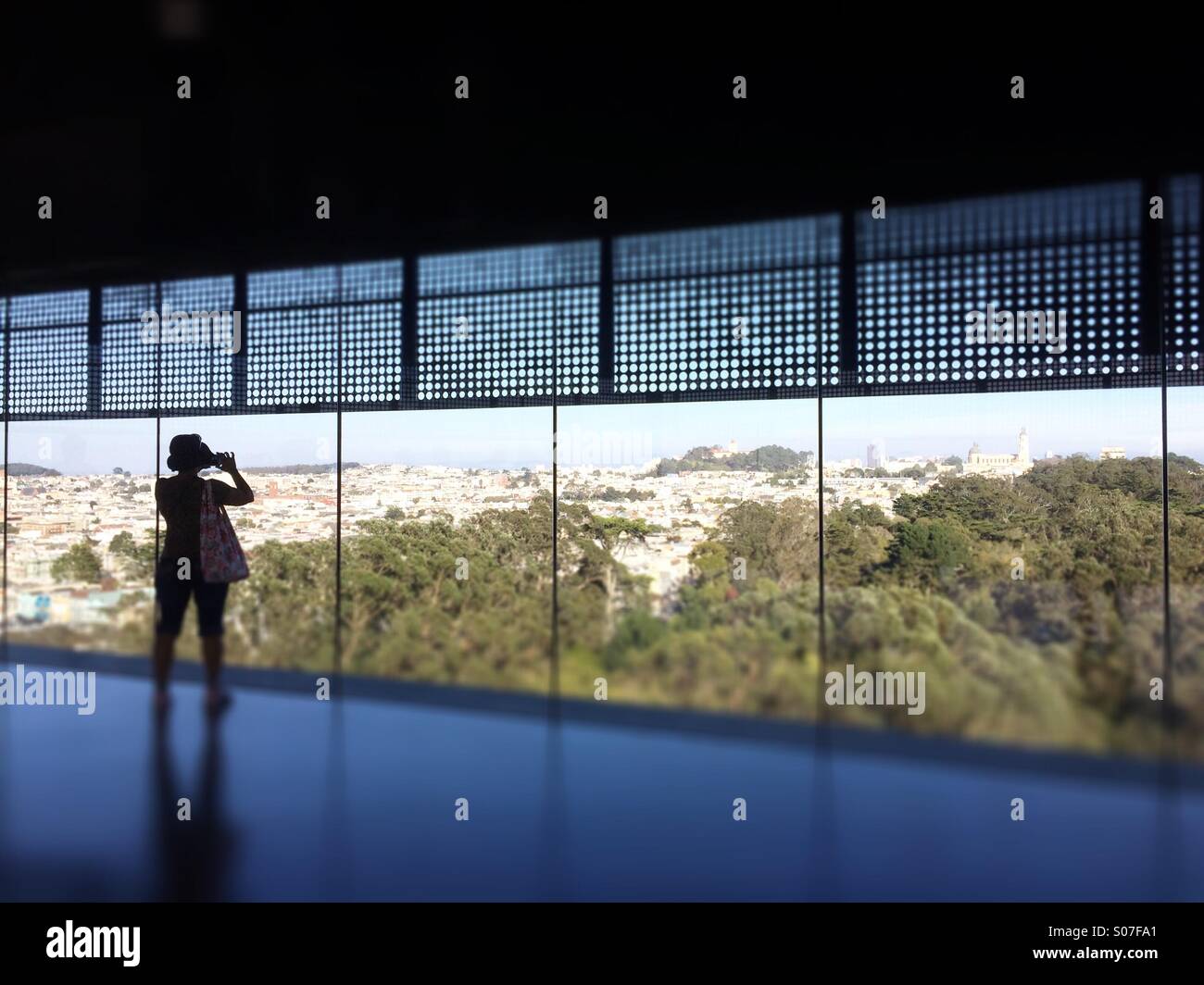 Tourist in De Young Museum, Golden Gate Park, San Francisco - Smartphone Captured Stock Image
