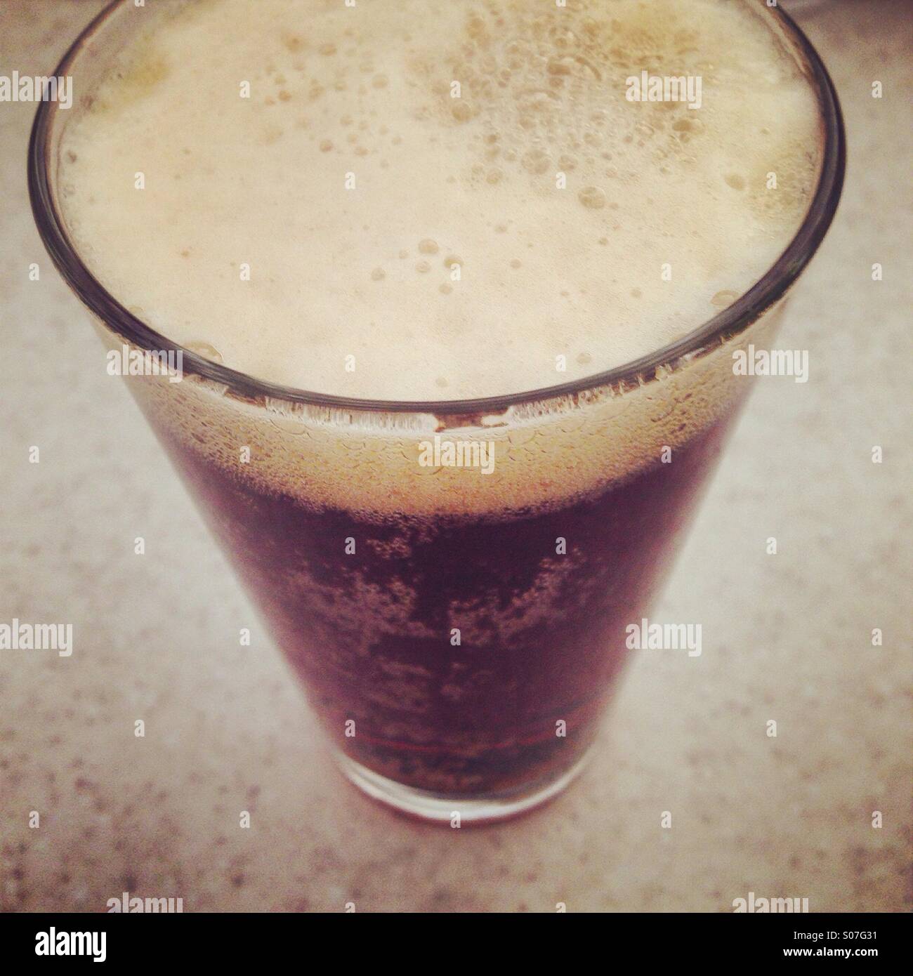 Dark beer in glass Stock Photo