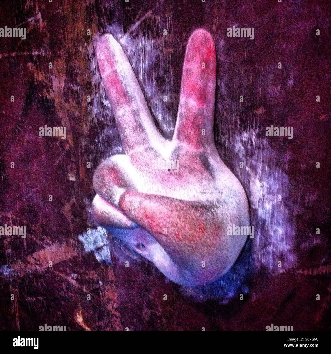 Hand doing the V sign for Victory - Smartphone Captured Stock Image