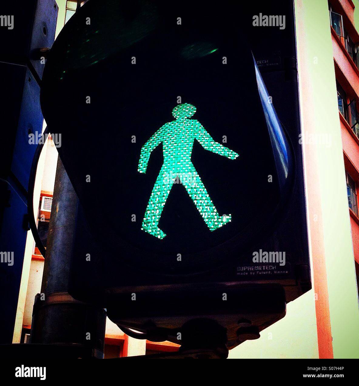 Green light man at the traffic light: Go! - Smartphone Captured Stock Image
