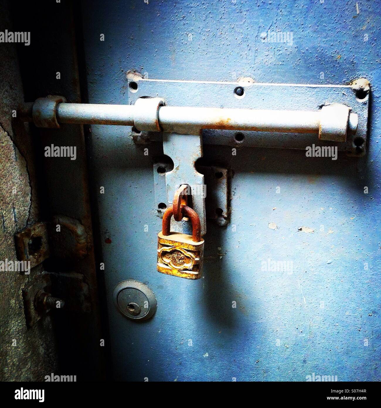 Door closed with a lock Stock Photo Alamy
