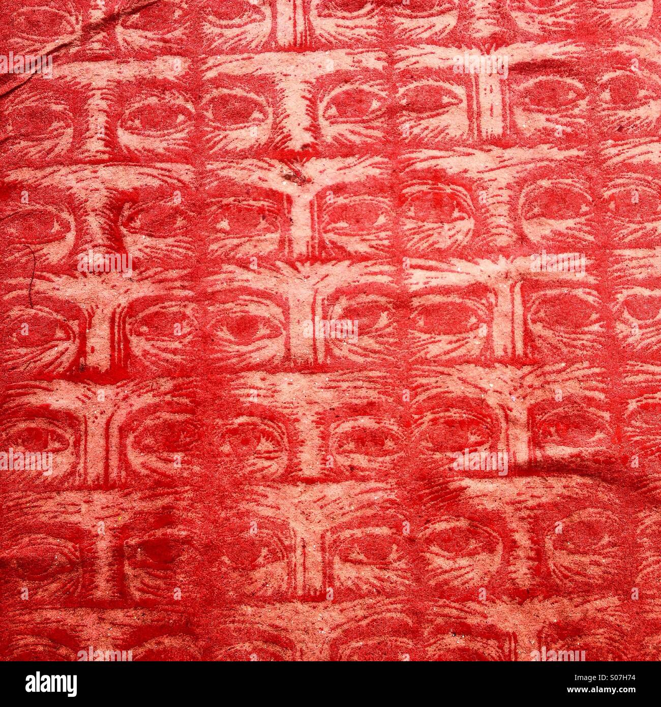 Eyes colored in red representing the 43 Ayotzinapa students missing in Iguala, Guerrero State are displayed in a poster after a protest demanding justice for the dissapeared students in Mexico City - Smartphone Captured Stock Image