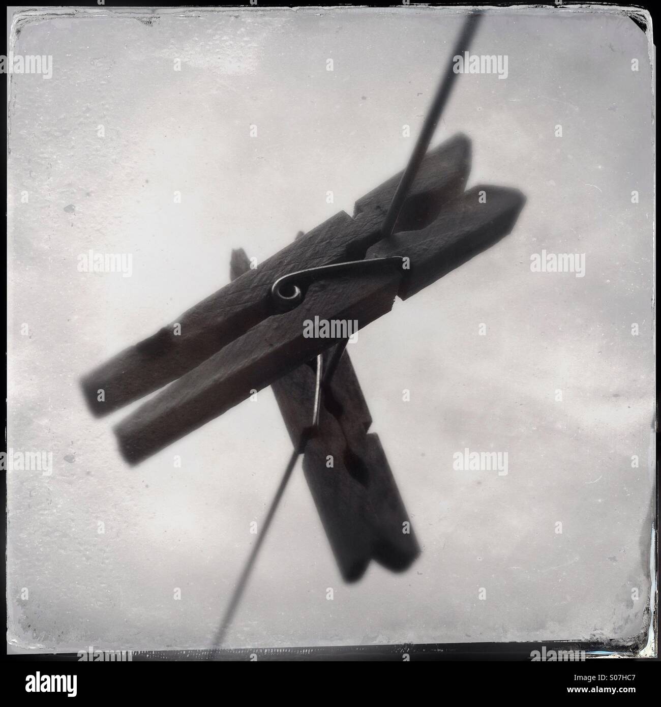 Wooden pegs photographed in vintage style - Smartphone Captured Stock Image