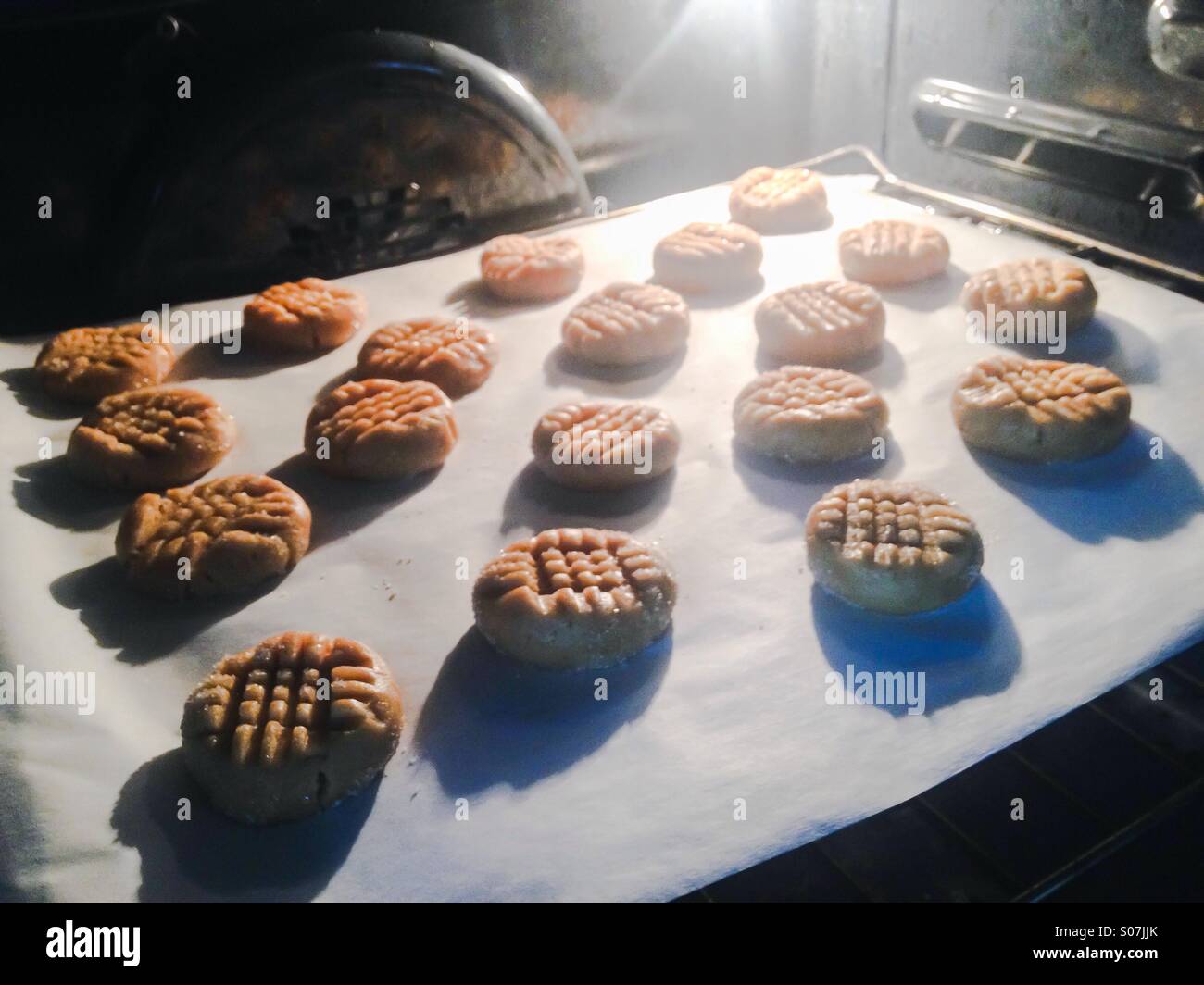 Line Upon Line Cookies Peanut butter cookies lined up on a cookie sheet, just placed in the ...
