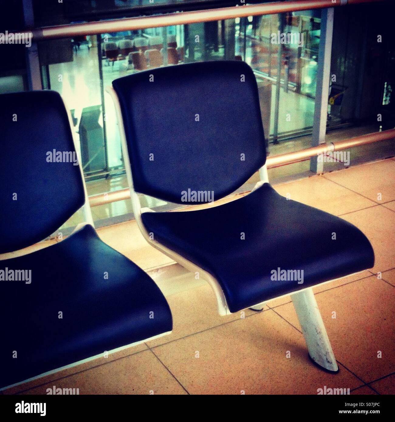 Empty seats at the departure gate - Smartphone Captured Stock Image
