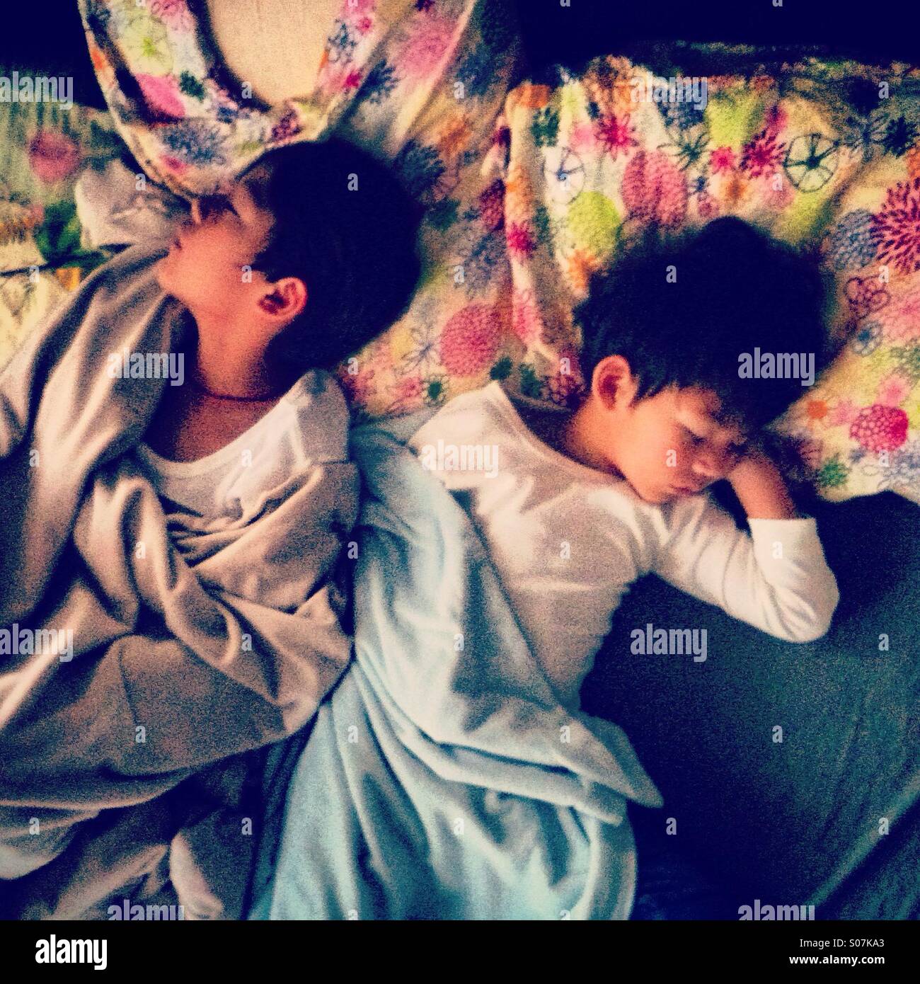 Two sleeping brother kid top view - Smartphone Captured Stock Image