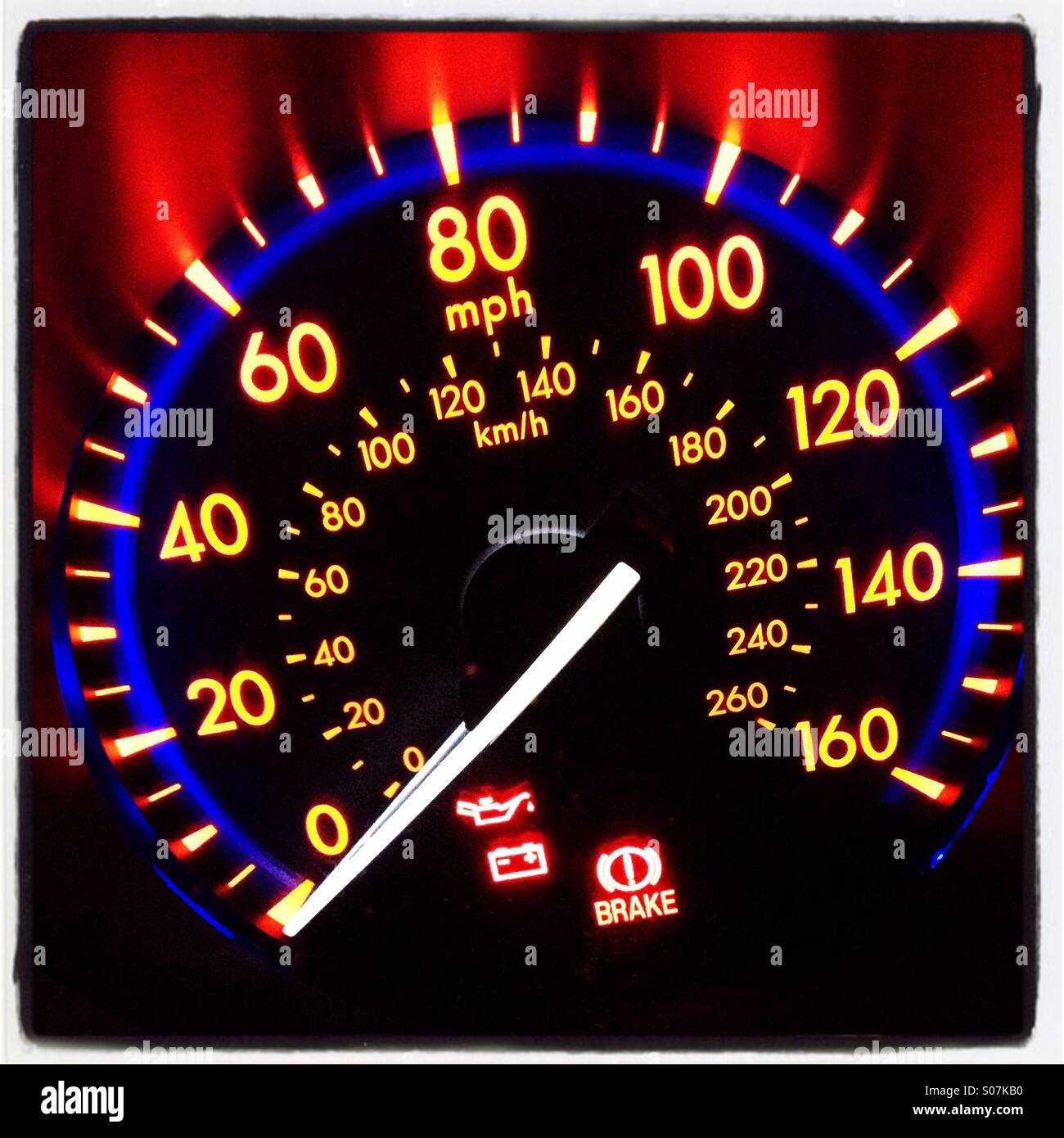 Illuminated speedometer of a car Stock Photo Alamy