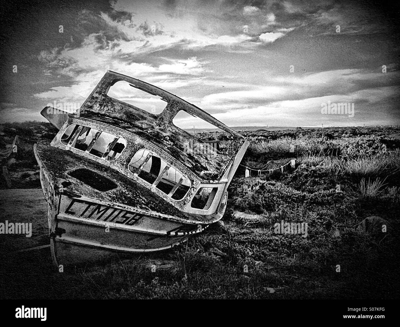 Stranded boat Stock Photo: 309955620 - Alamy