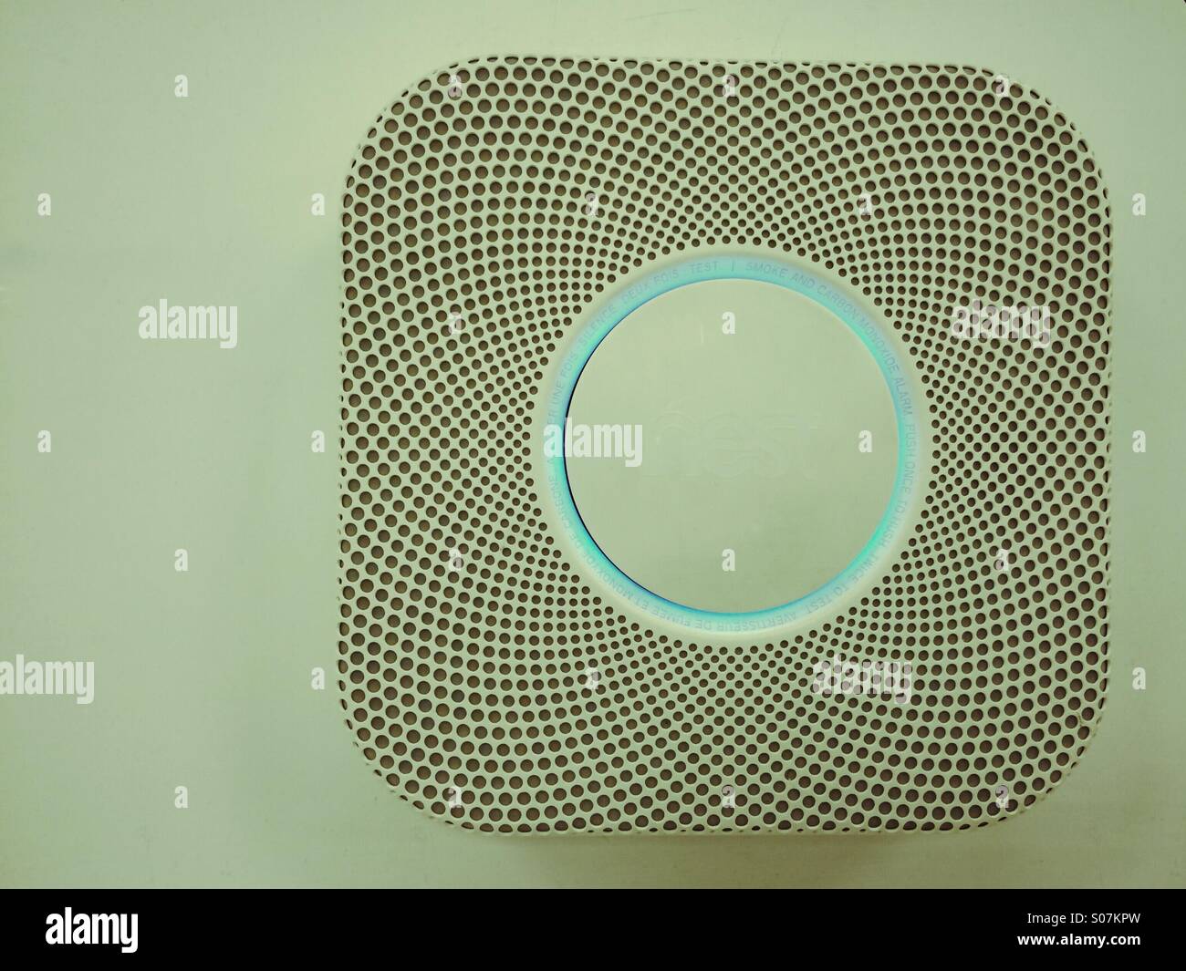 NEST Smoke Alarm and Carbon Monoxide Detector - Smartphone Captured Stock Image