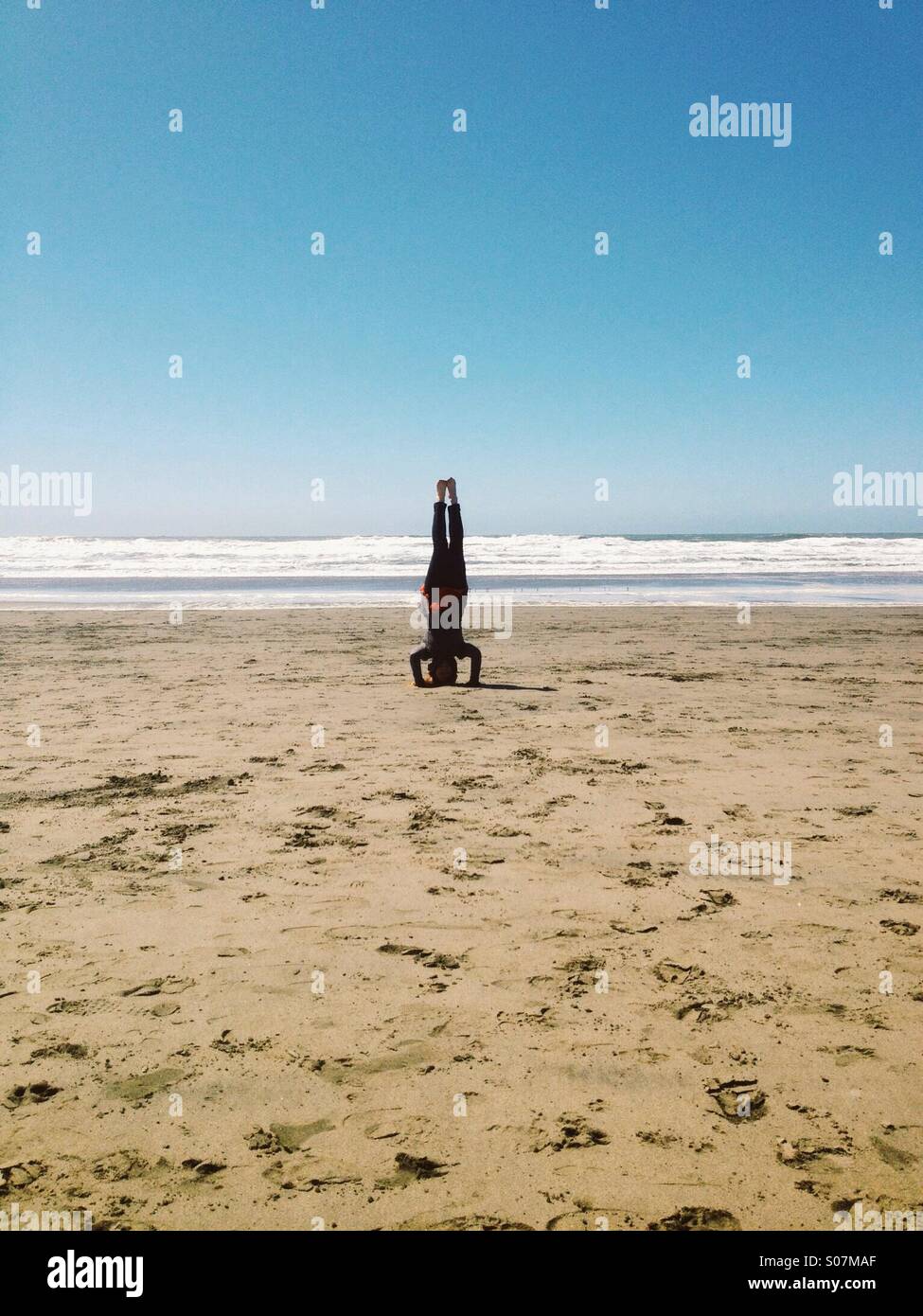 Headstand in the beach - Smartphone Captured Stock Image