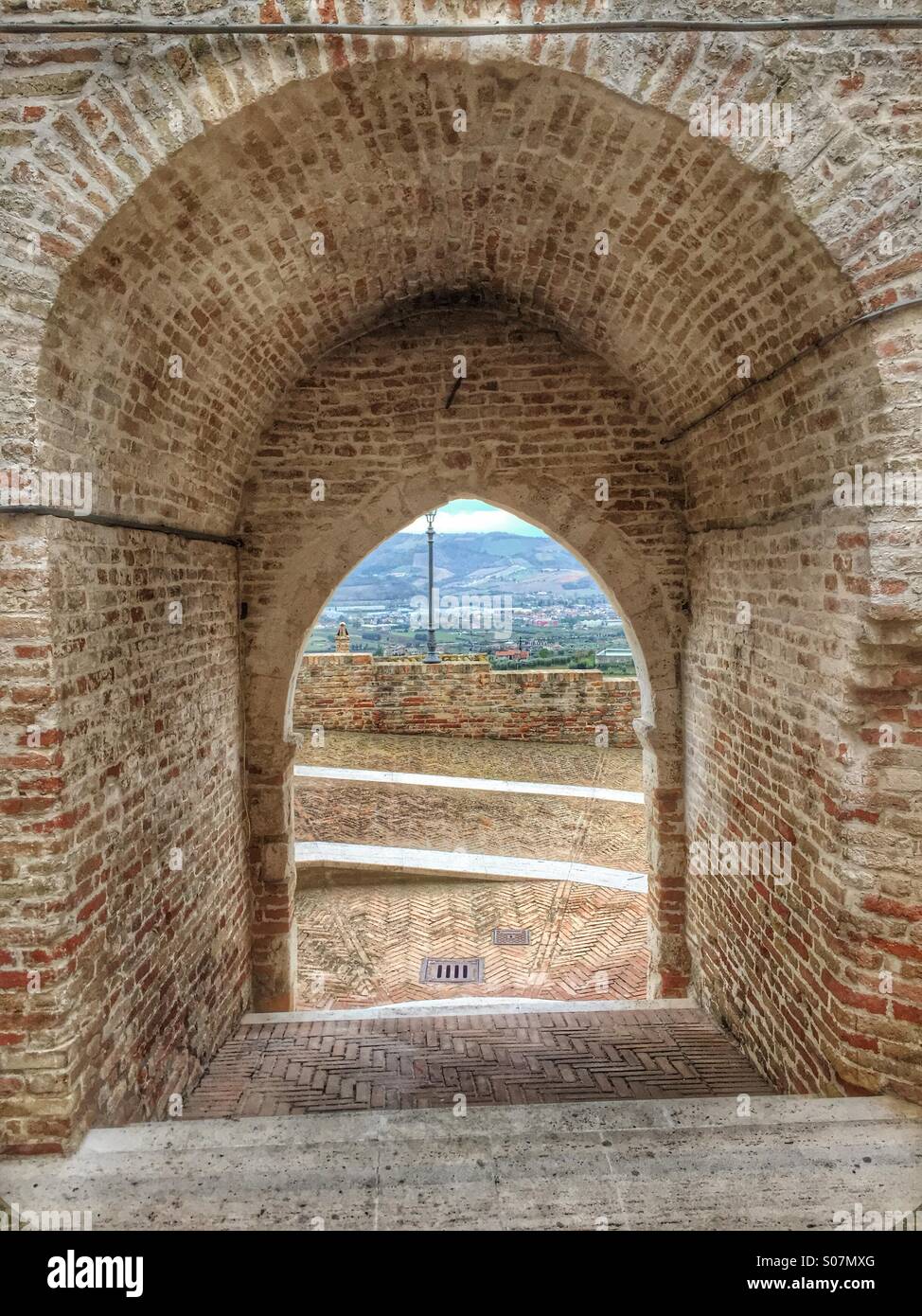 View through a city gate, Spinetoli,Marche region,Italy Stock Photo