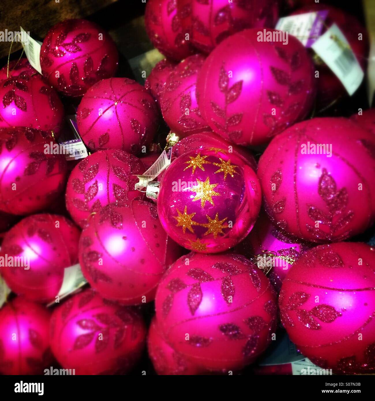 Pink Christmas tree baubles Stock Photo Alamy