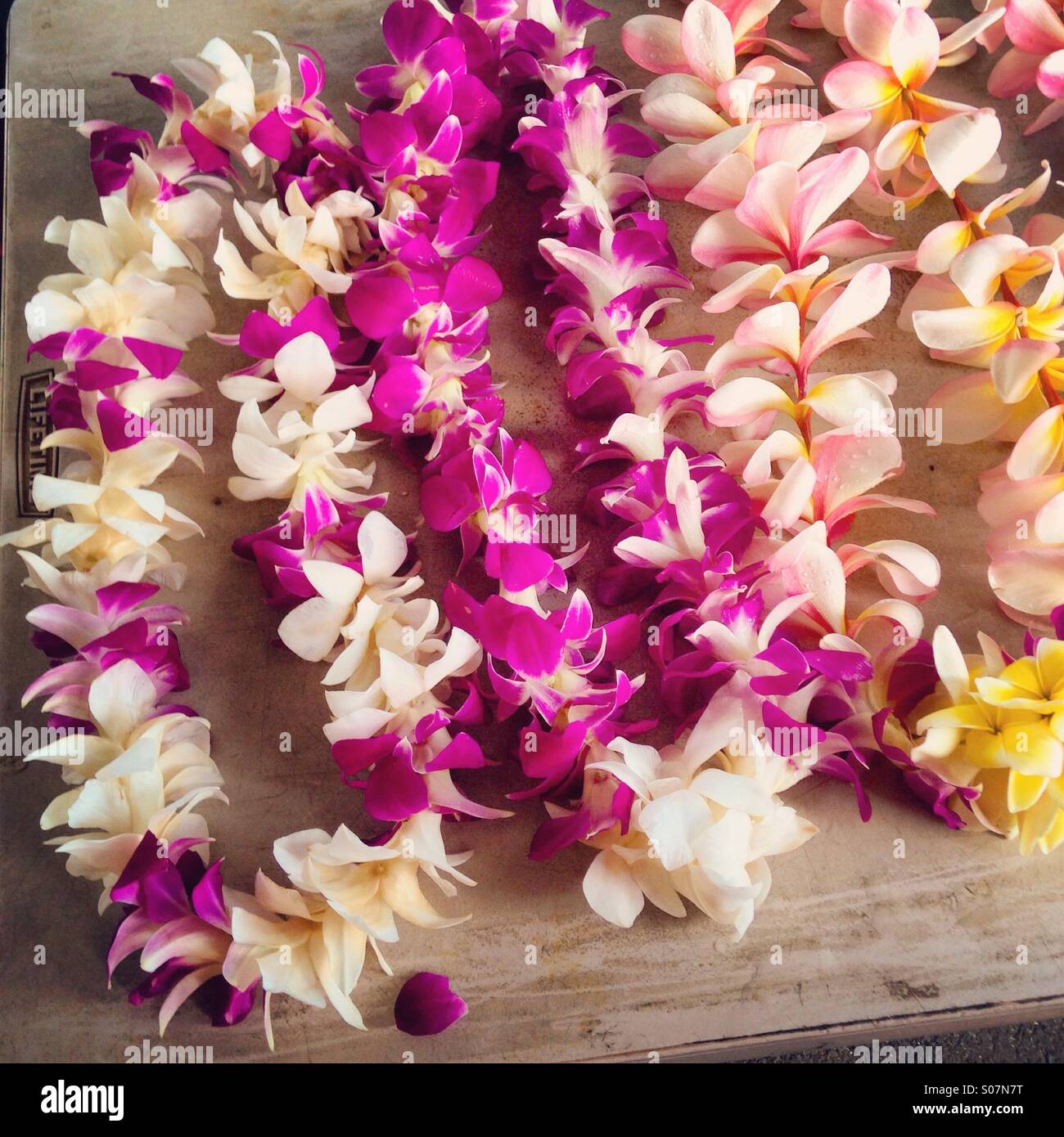 Leis of flowers, a cultural tradition in Hawaii Stock Photo