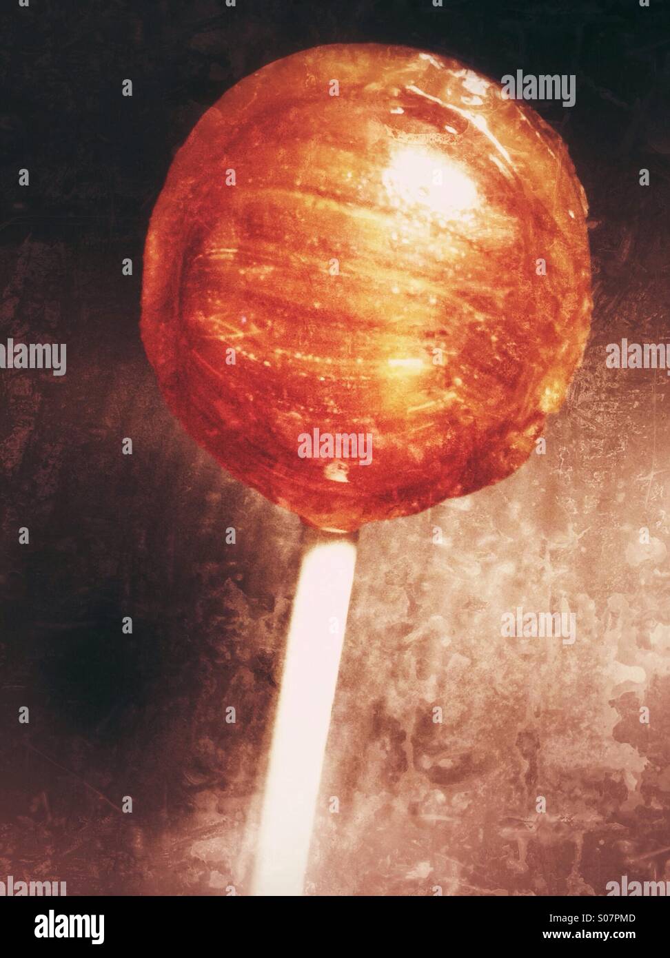 An orange sucker. - Smartphone Captured Stock Image