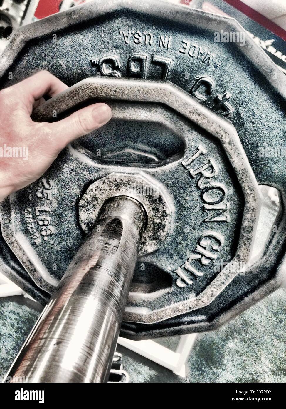 Weights on a barbell - Smartphone Captured Stock Image