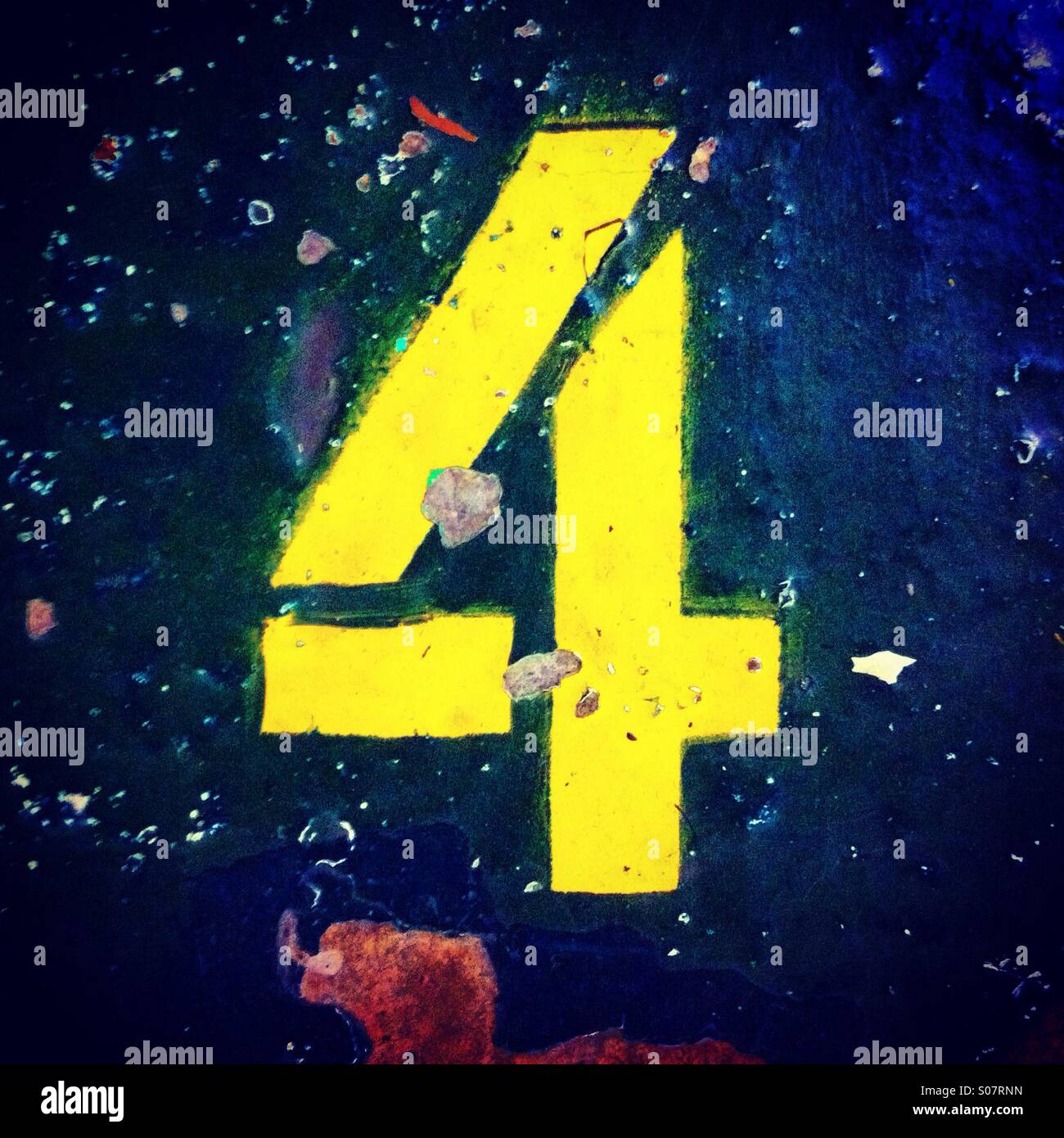 Number 4 painted on the floor in stencil style - Smartphone Captured Stock Image