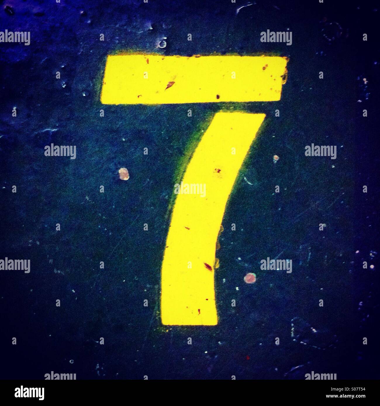 Number 7 painted on the floor in stencil style Stock Photo