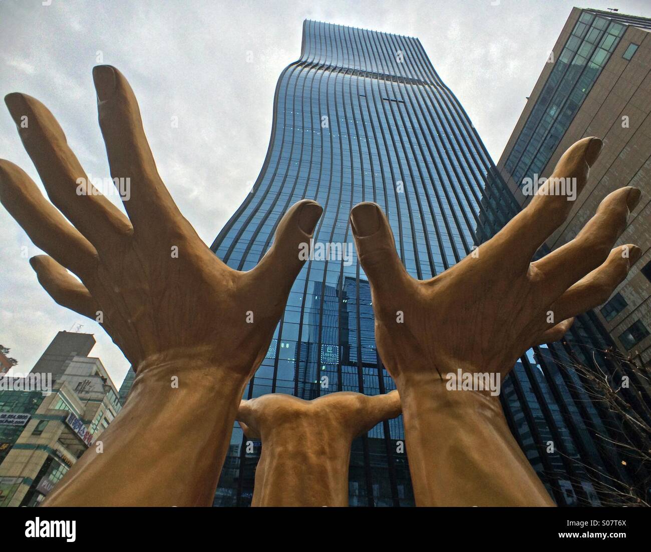 Hand Sculpture below GT Tower East building, Gangnam District, Seoul, Korea Stock Photo