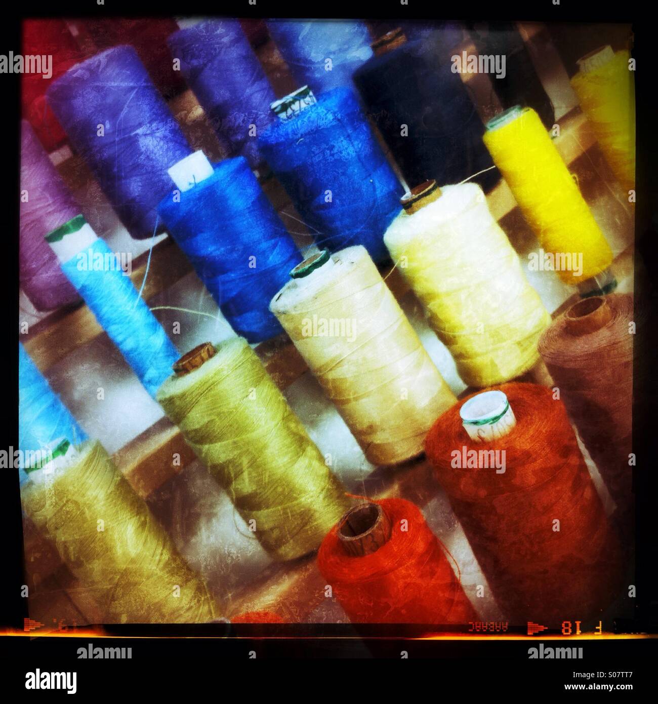 Spools of coloured cotton threads - Smartphone Captured Stock Image