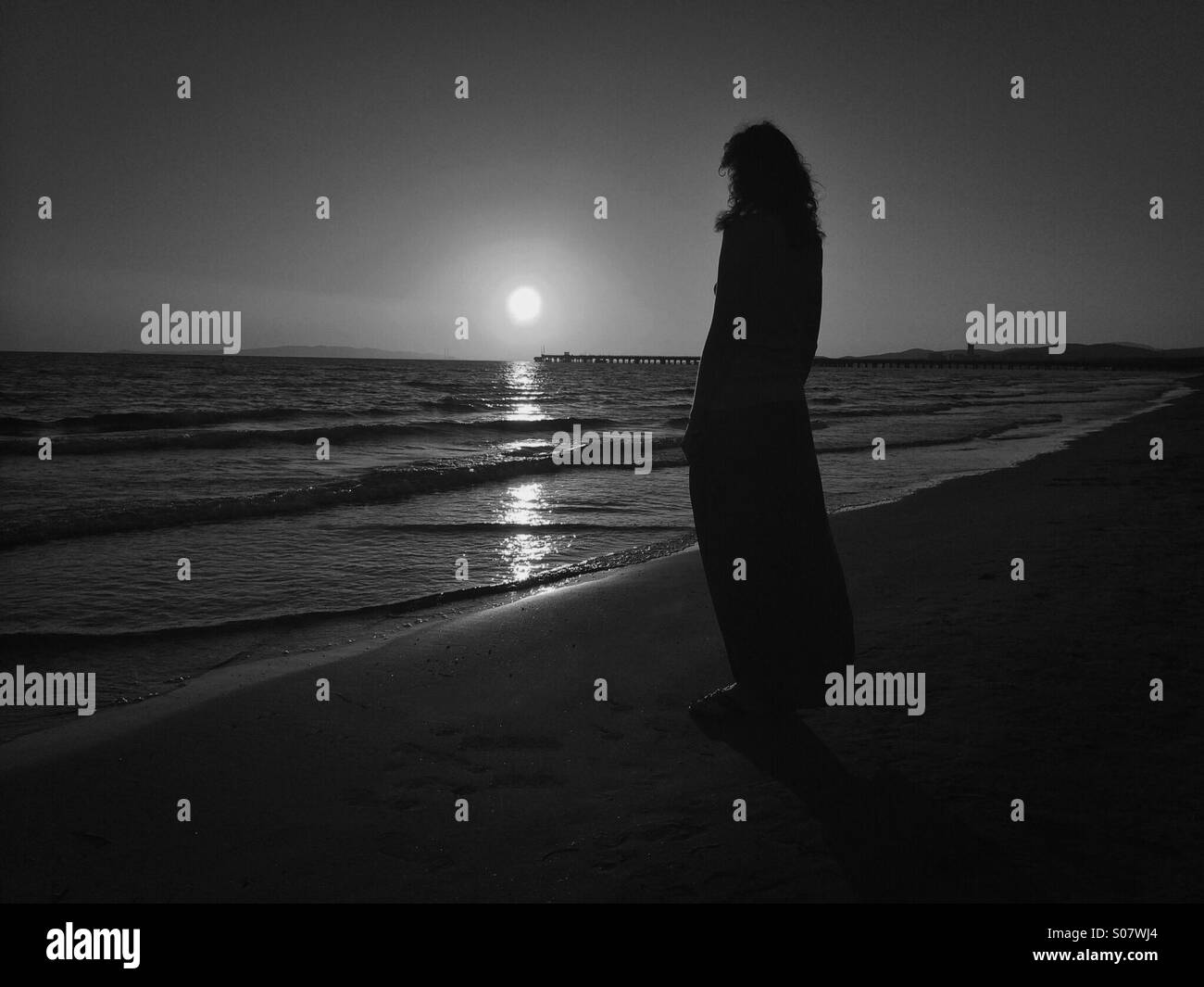 Woman sunset Black and White Stock Photos & Images - Alamy