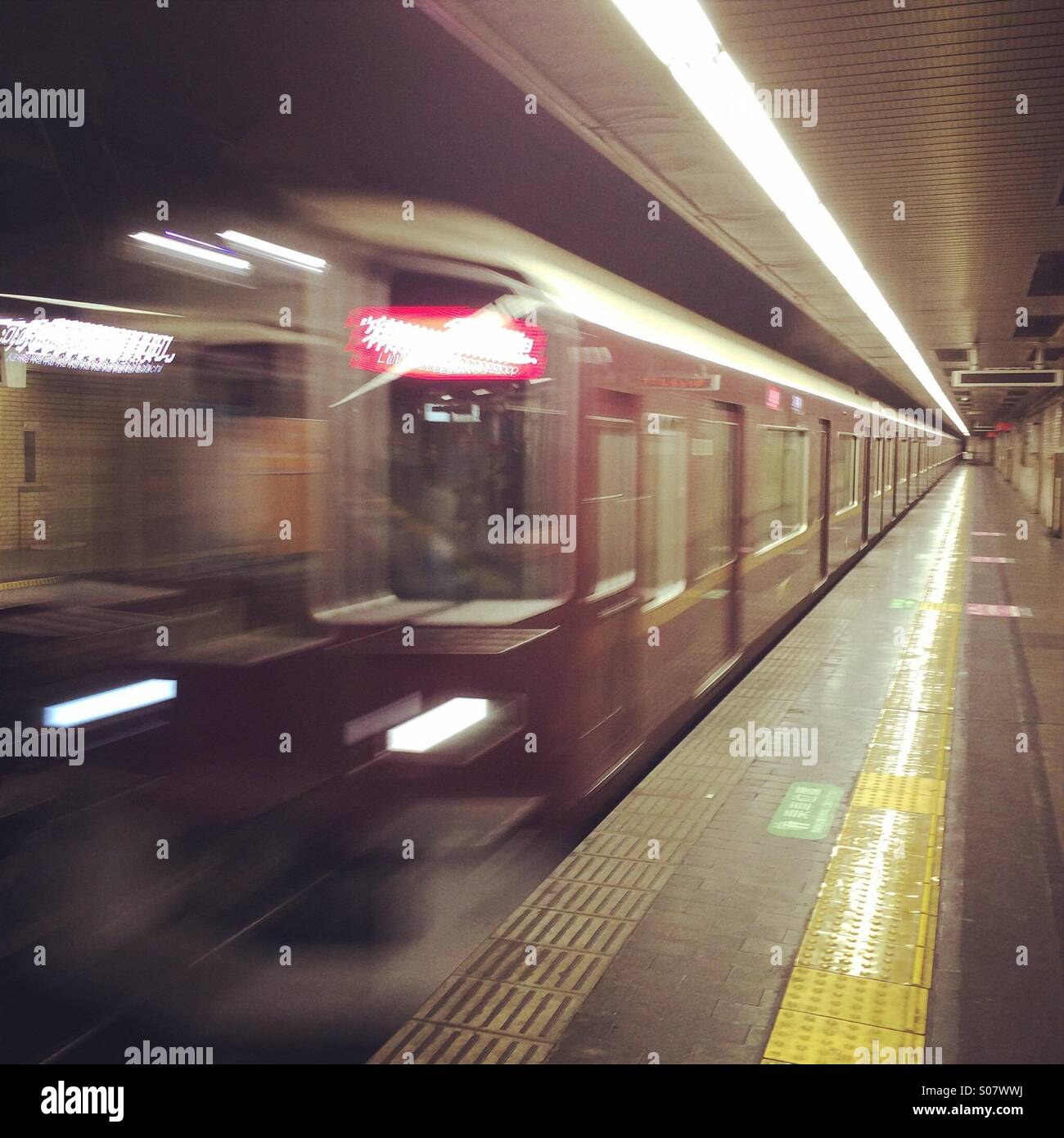 Kyoto subway train, entering station, Kyoto, Japan - Smartphone Captured Stock Image