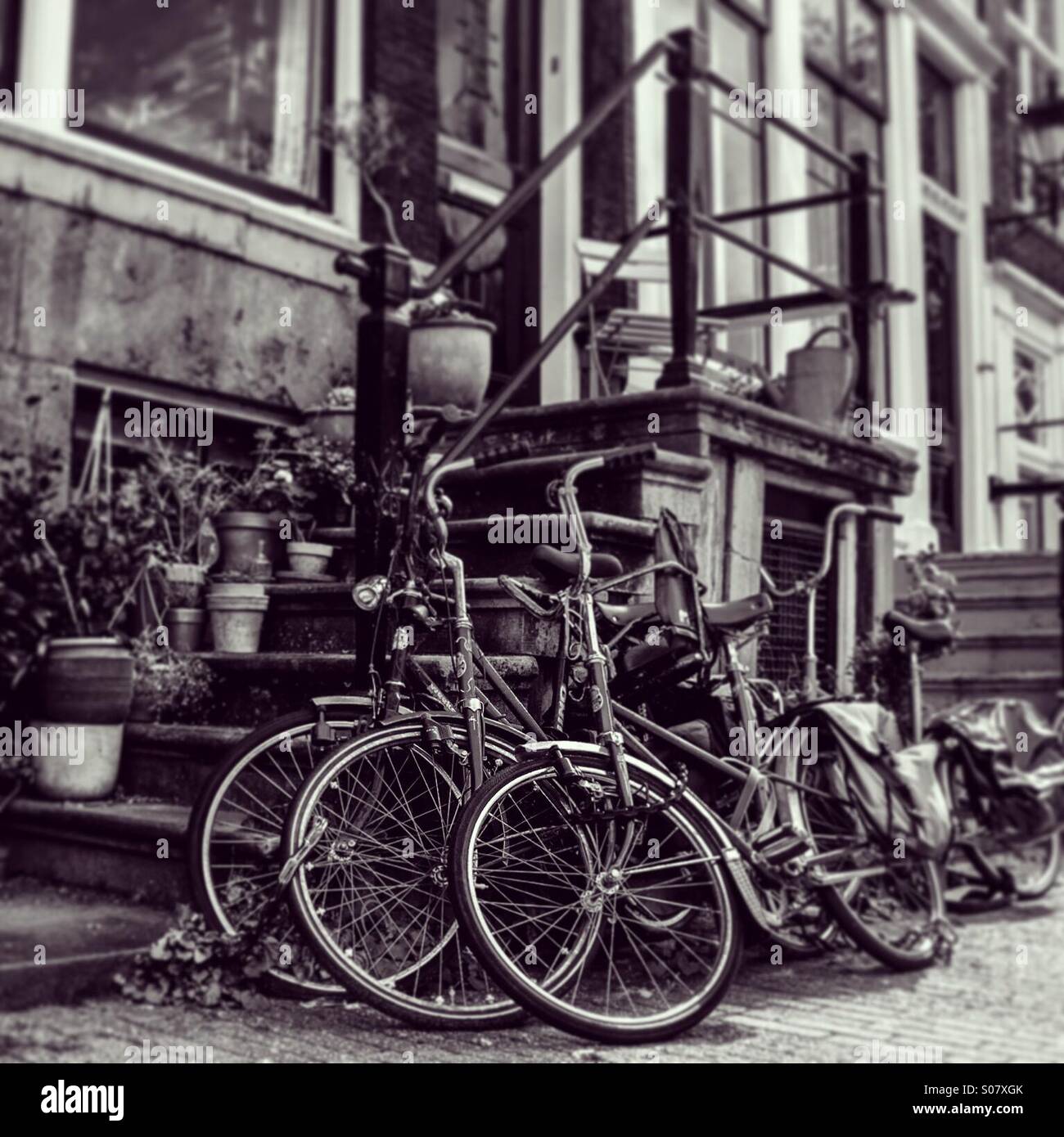 Black and white Amsterdam street scene with bikes - Smartphone Captured Stock Image