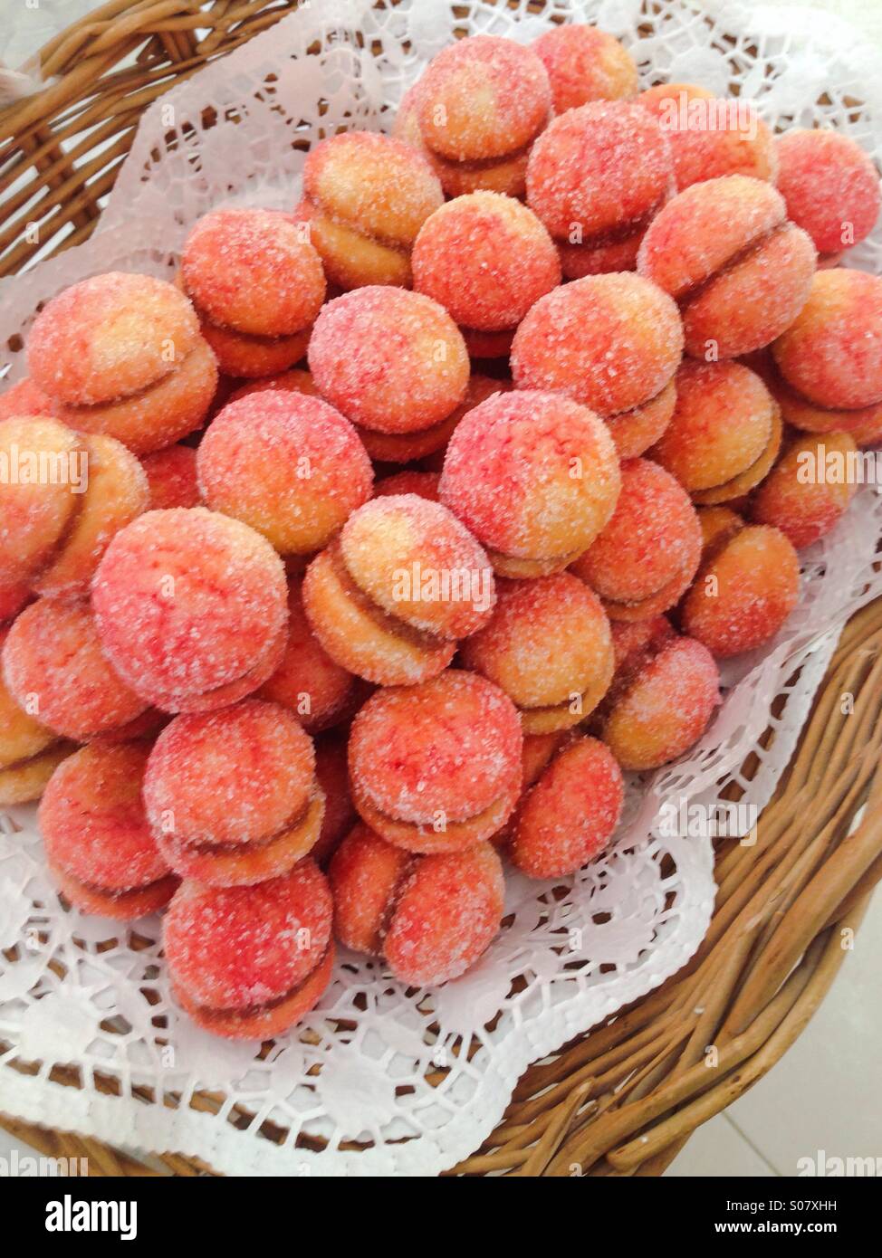 Colorful macaroons in basket Stock Photo