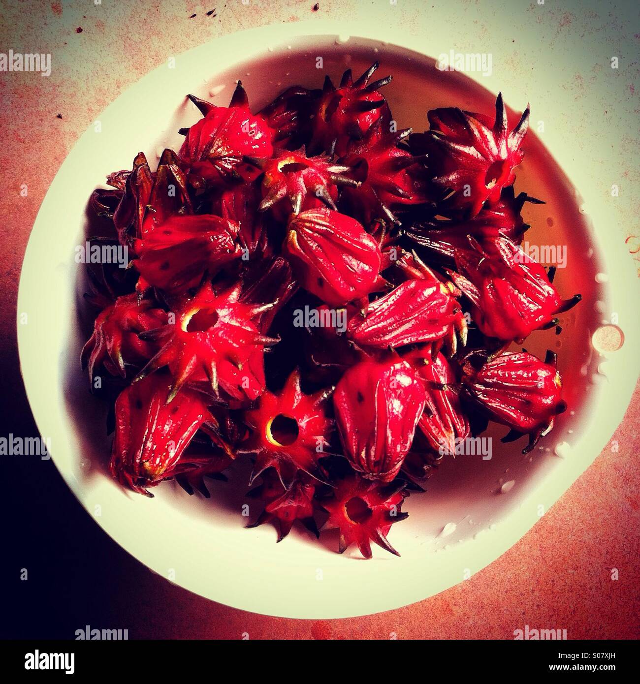 Top view of rosene fruots top view in a plastic basket - Smartphone Captured Stock Image