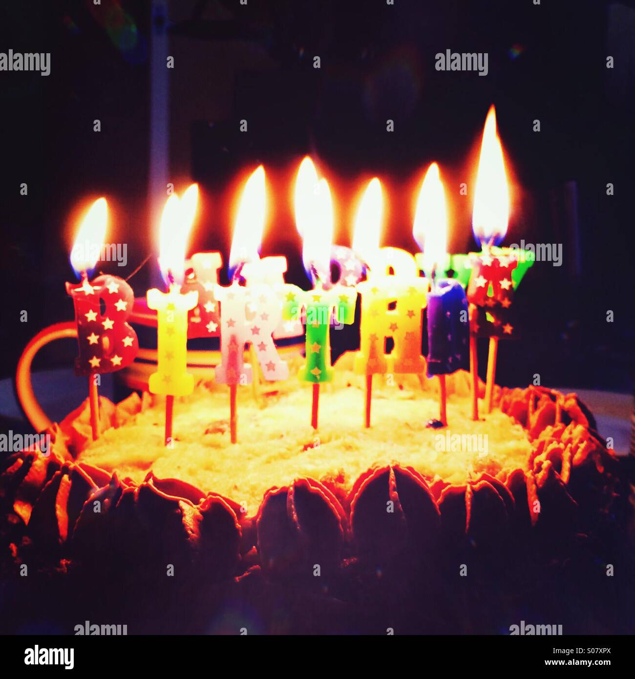Happy birthday cake and candles Stock Photo - Alamy