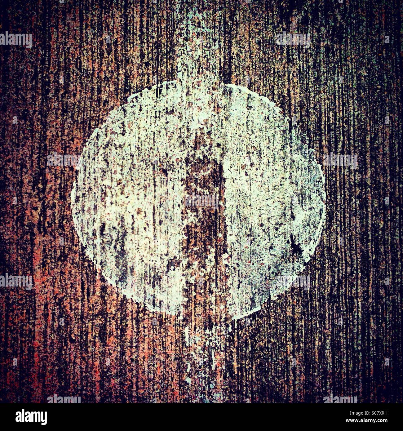 Round painted in white on a outdoor playground - Smartphone Captured Stock Image