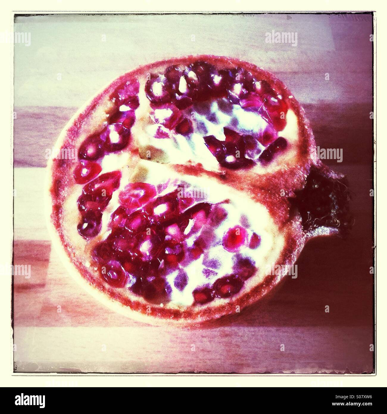 Pomegranate fruit halved - Smartphone Captured Stock Image