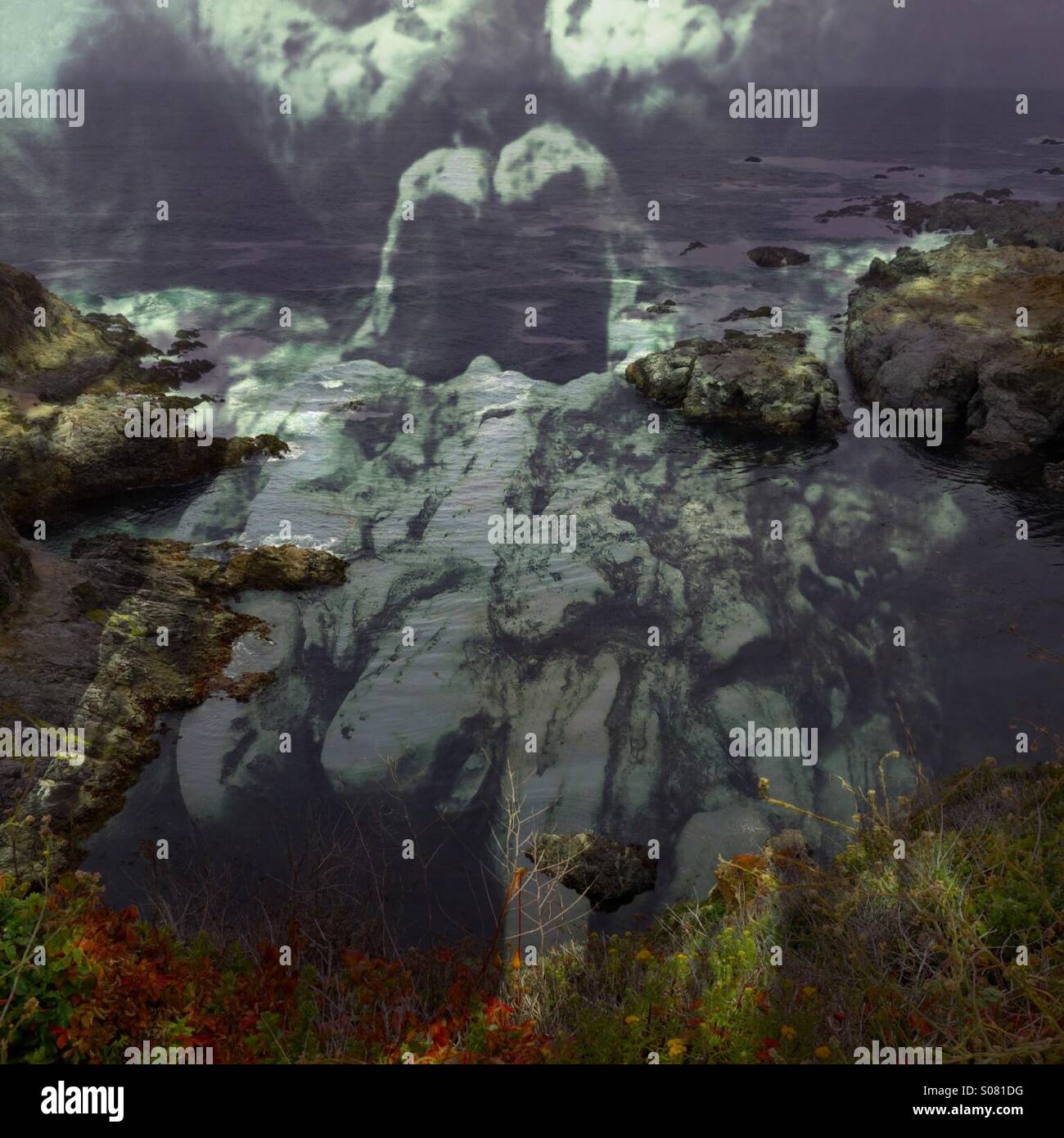 A double exposure of a scary skull blended with a photo of Big Sur, California. - Smartphone Captured Stock Image