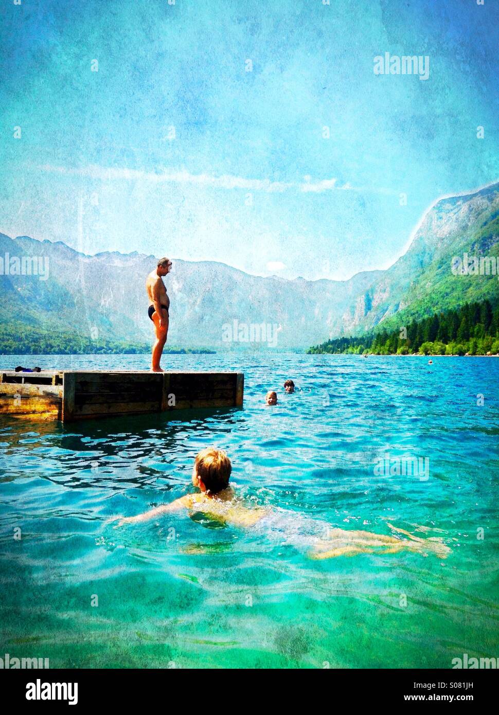 A summer swim - cooling off in Lake Bohinj, Slovenia Stock Photo
