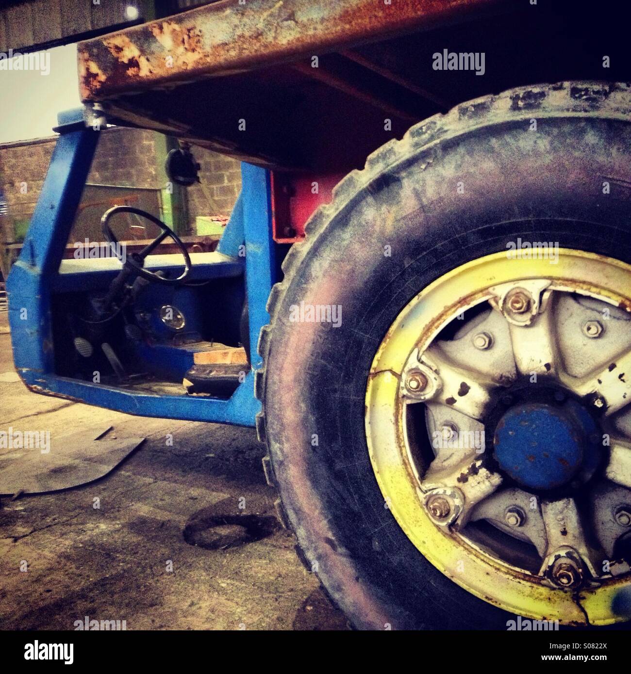 Old truck with big wheel Stock Photo Alamy