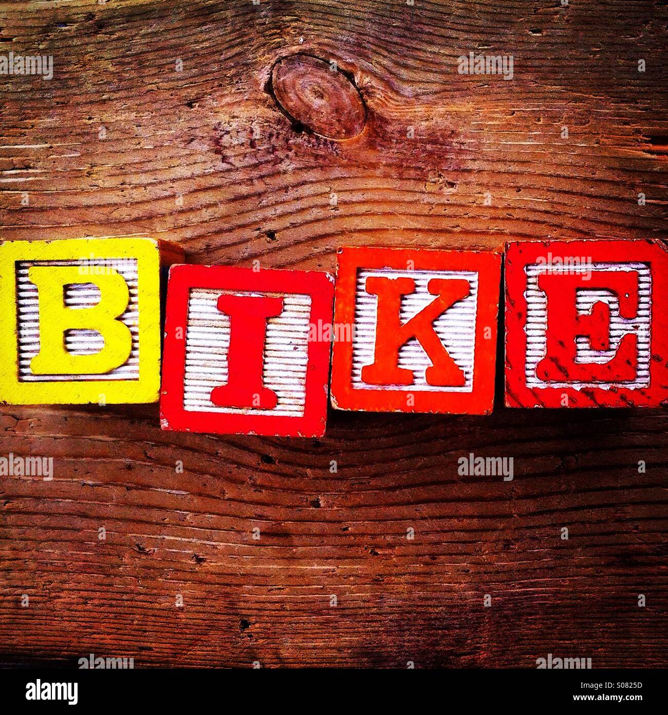 Word BIKE written with wood blocks toys - Smartphone Captured Stock Image