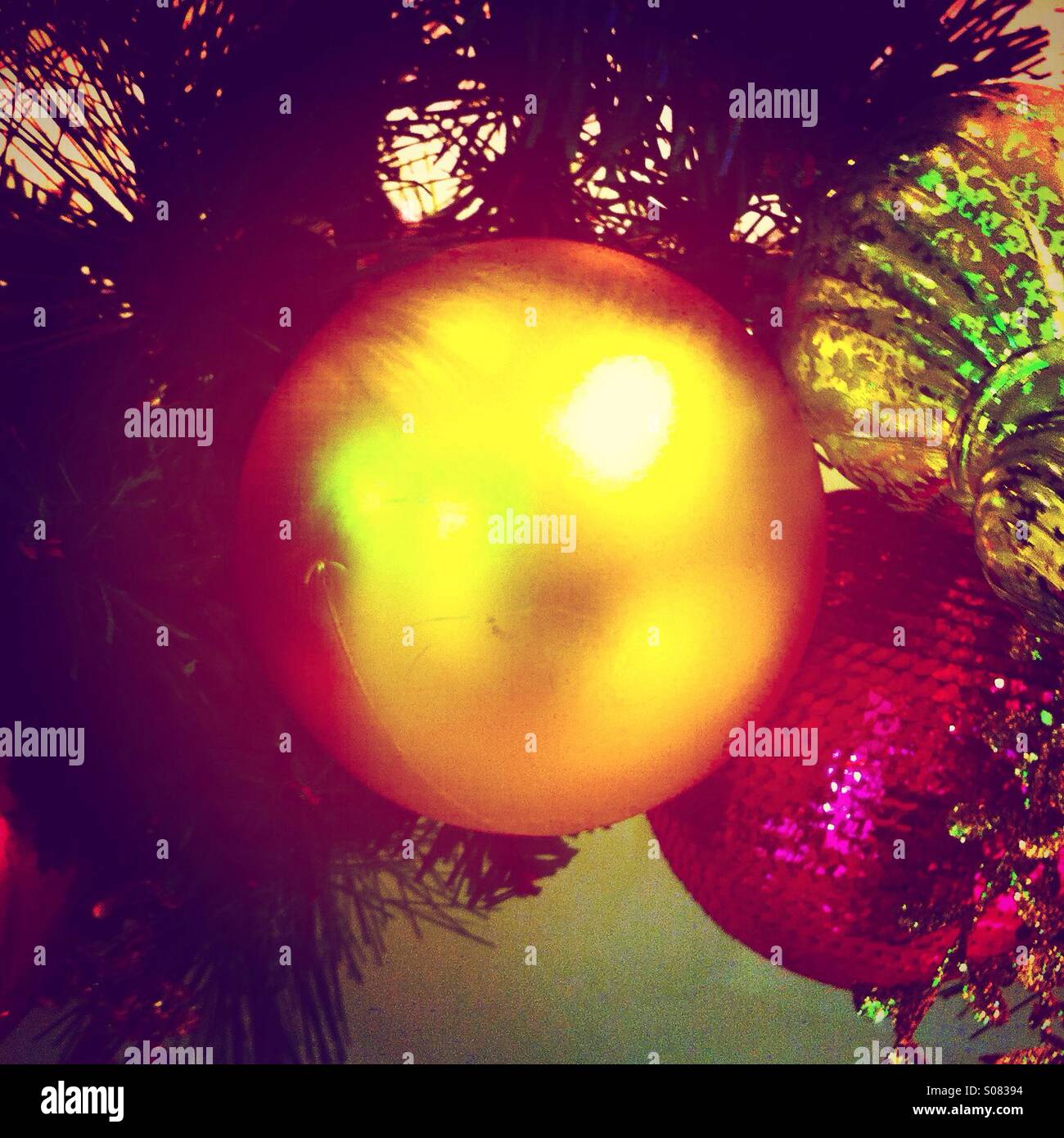 Shiny golden christmas ball decoration - Smartphone Captured Stock Image
