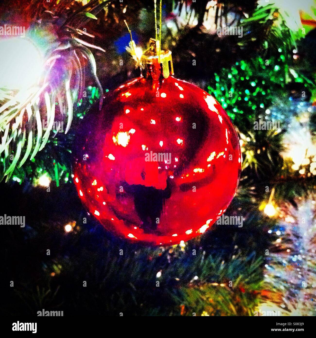 Shiny red christmas ball hires stock photography and images Alamy