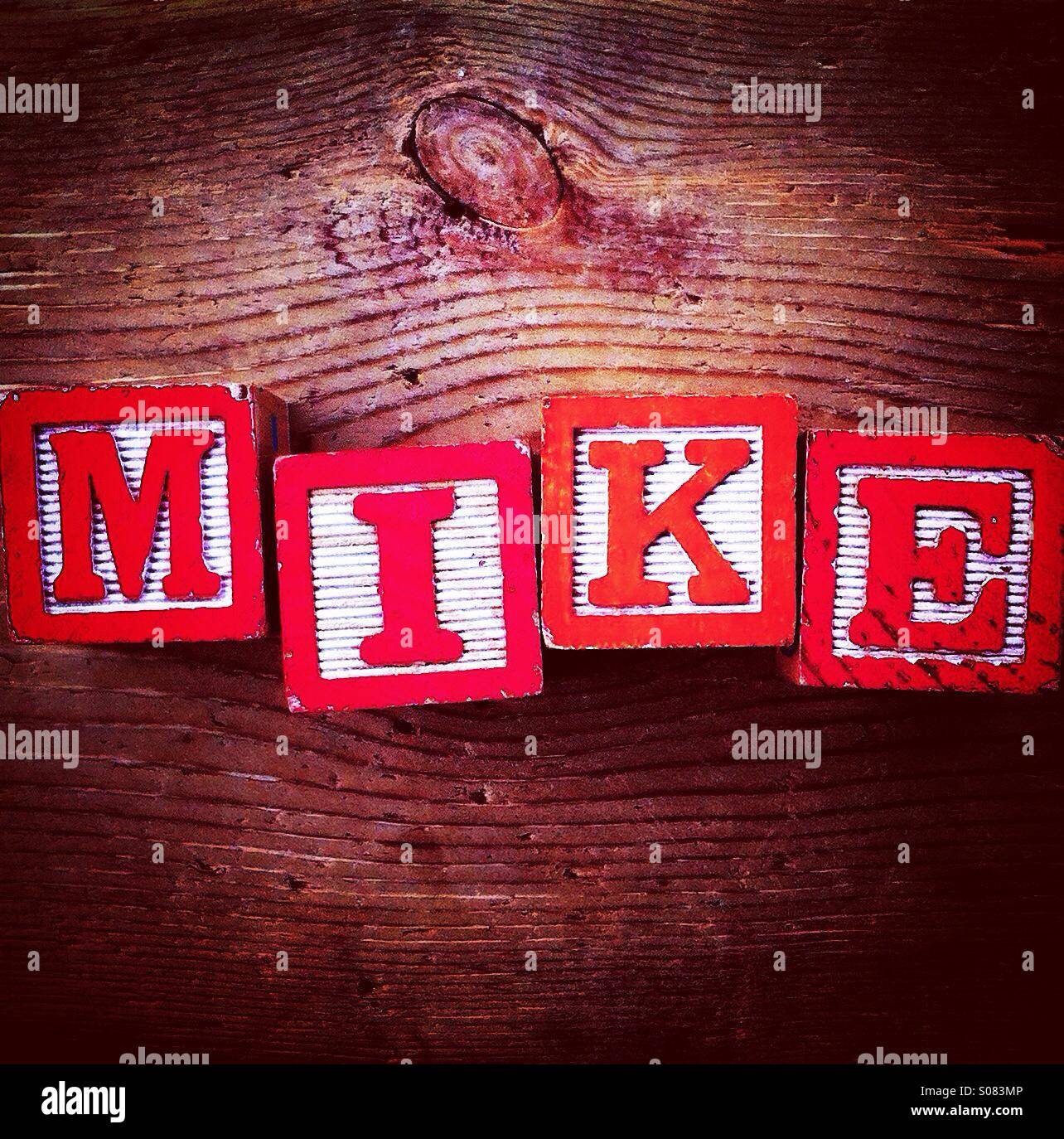 Word name MIKE in red wood blocks Stock Photo