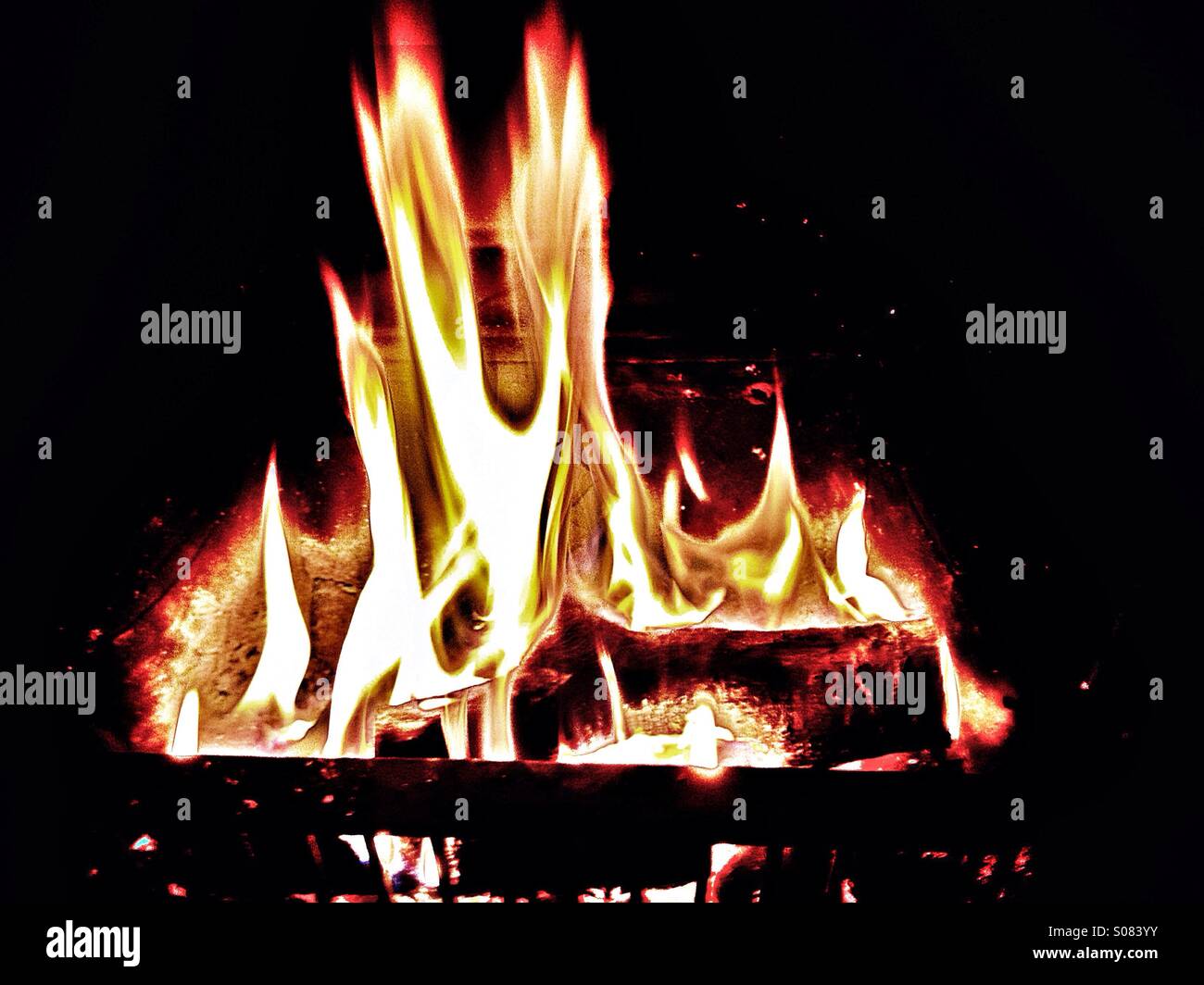 Burning fire in open grate Stock Photo Alamy