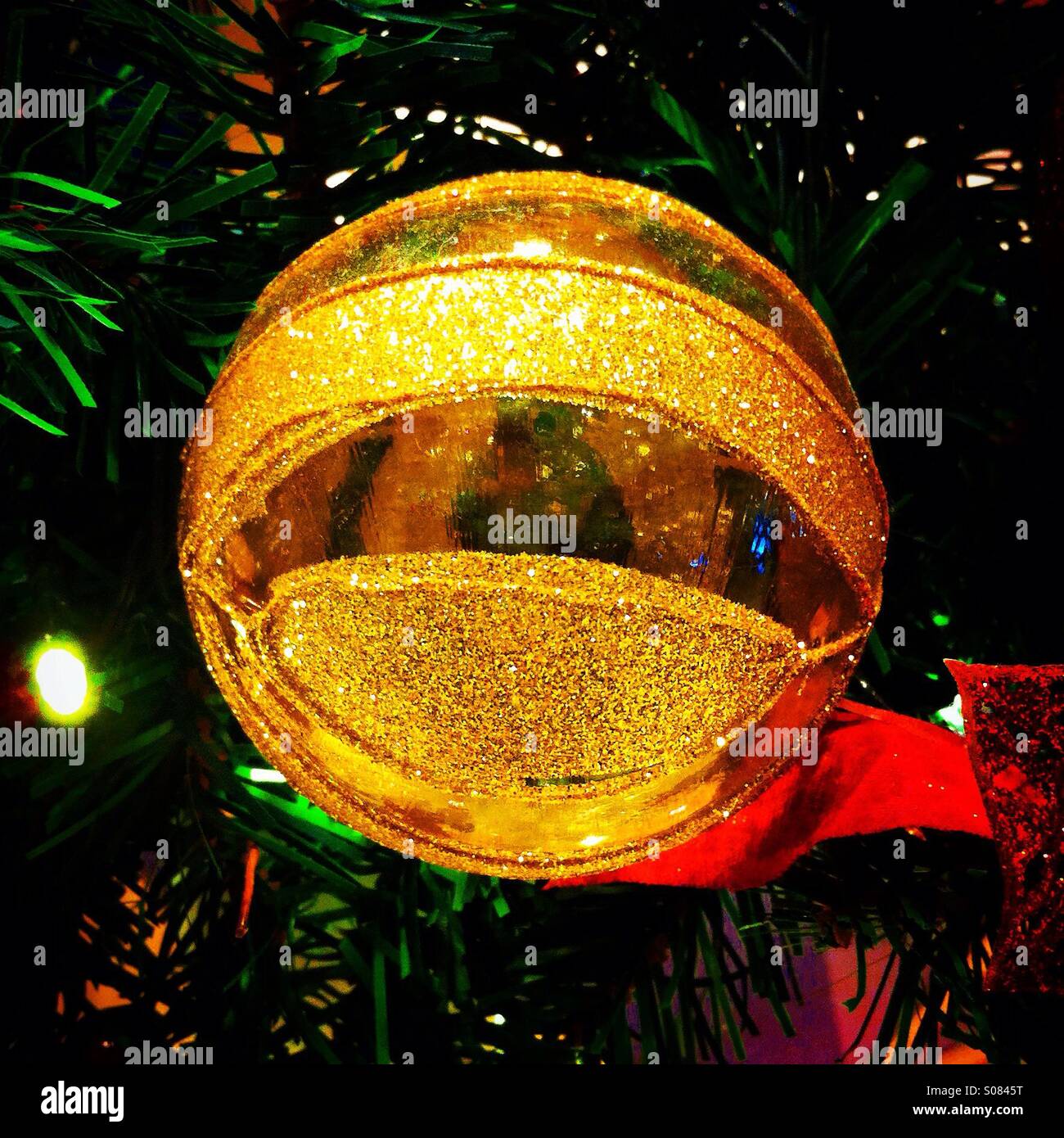 Shony golden christmas ball decoration - Smartphone Captured Stock Image