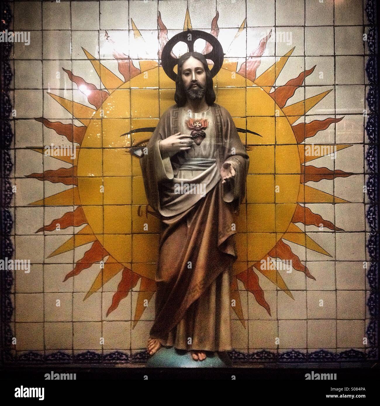 An image of the Sacred Heart of Jesus and a sun decorate a chapel in Tepeyac mountain in Our Lady of Guadalupe Basilica, Mexico City,Mexico - Smartphone Captured Stock Image