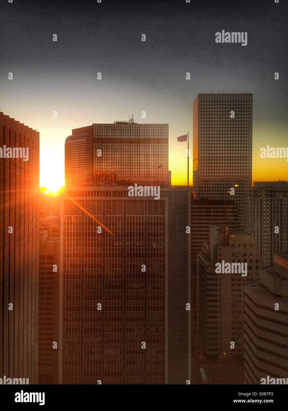 Sunrise amongst office buildings in Denver, Colorado - Smartphone Captured Stock Image