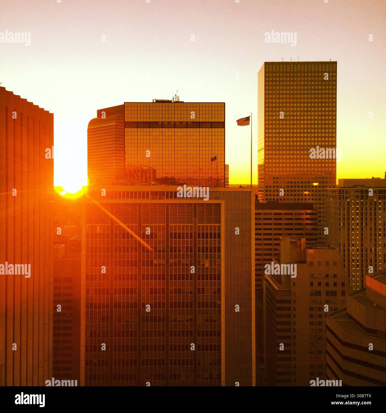 Downtown Denver sunrise among office buildings - Smartphone Captured Stock Image