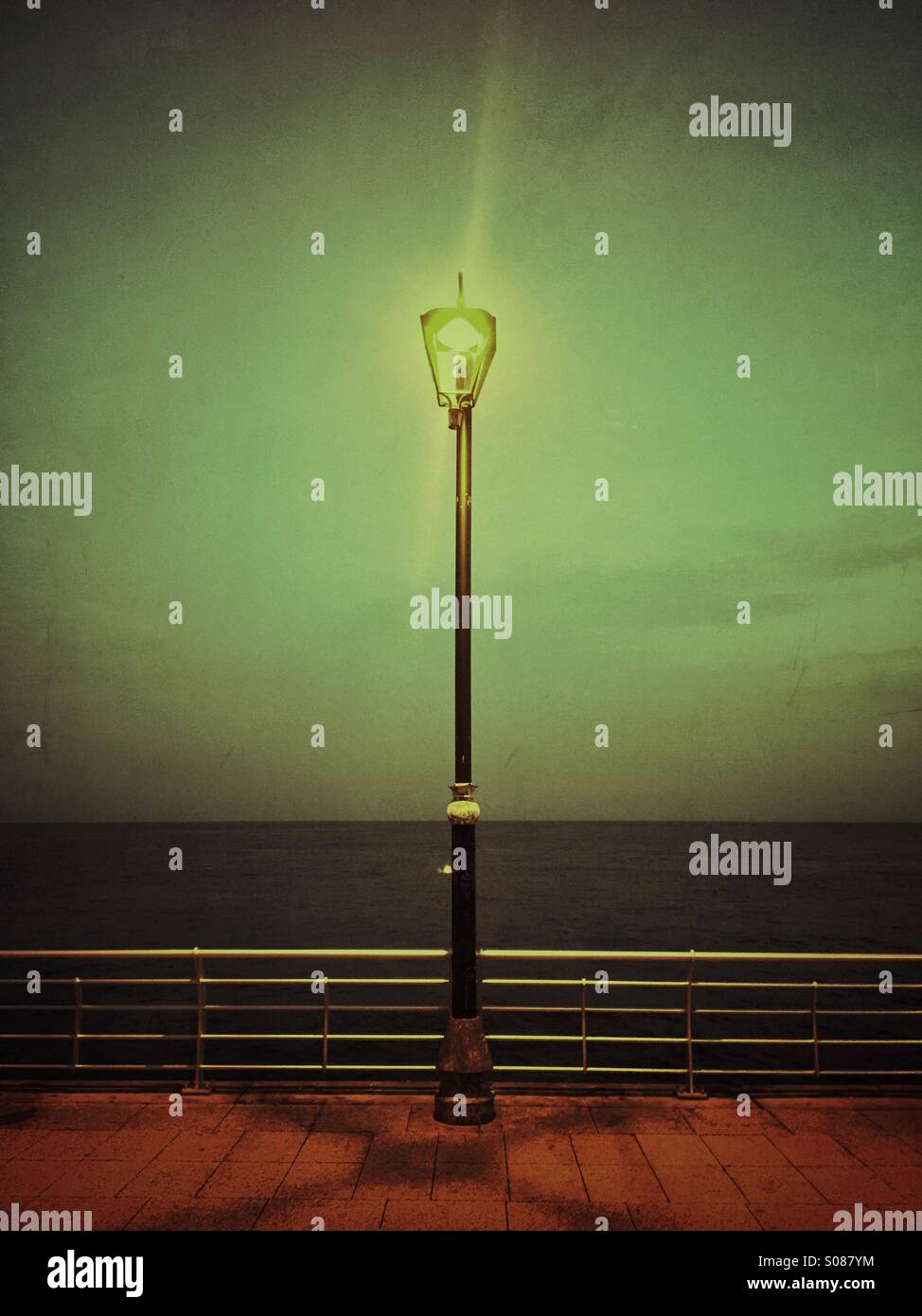 Lamppost by the sea - Smartphone Captured Stock Image